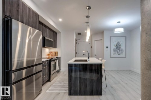 206 11969 Jasper Avenue, Edmonton, AB - Indoor Photo Showing Kitchen With Upgraded Kitchen