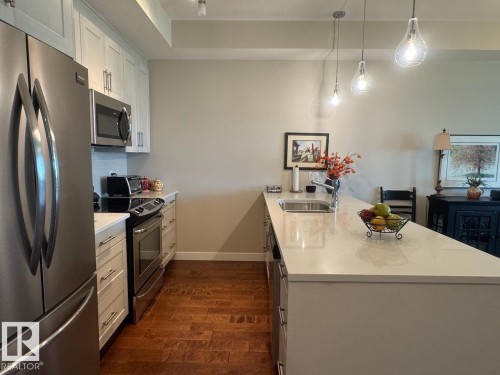 404 625 Leger Way, Edmonton, AB - Indoor Photo Showing Kitchen With Double Sink With Upgraded Kitchen