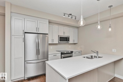 404 625 Leger Way, Edmonton, AB - Indoor Photo Showing Kitchen With Double Sink