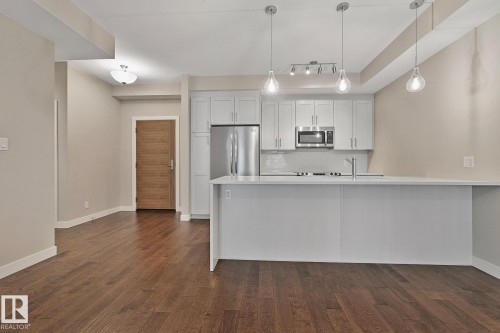 404 625 Leger Way, Edmonton, AB - Indoor Photo Showing Kitchen With Upgraded Kitchen