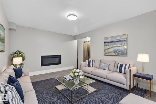 146 Callingwood Place, Edmonton, AB - Indoor Photo Showing Living Room With Fireplace