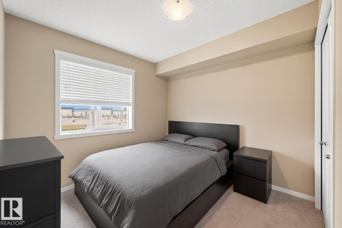 205 5810 Mullen Place, Edmonton, AB - Indoor Photo Showing Bedroom