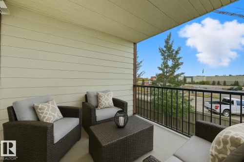 Virtually staged patio - 205 5810 Mullen Place, Edmonton, AB - Outdoor With Exterior