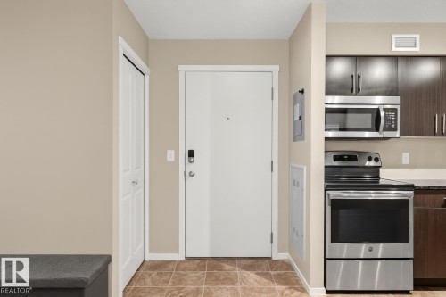 205 5810 Mullen Place, Edmonton, AB - Indoor Photo Showing Kitchen