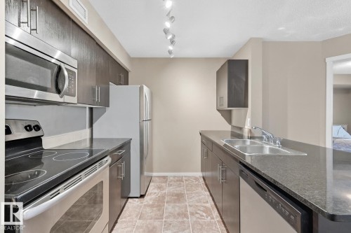 205 5810 Mullen Place, Edmonton, AB - Indoor Photo Showing Kitchen With Double Sink