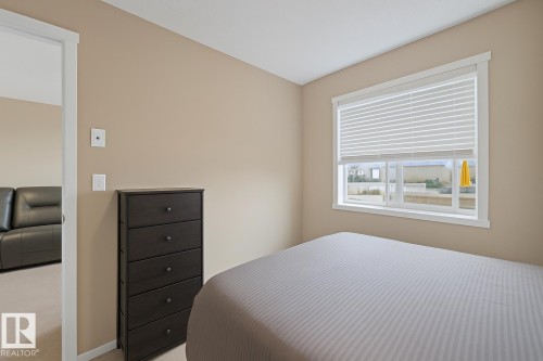 205 5810 Mullen Place, Edmonton, AB - Indoor Photo Showing Bedroom