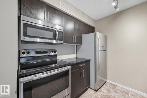 205 5810 Mullen Place, Edmonton, AB - Indoor Photo Showing Kitchen
