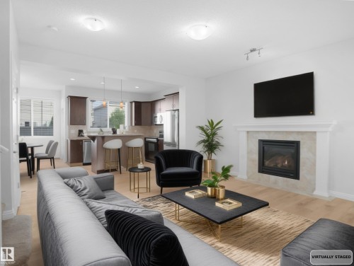 2533 Cole Crescent, Edmonton, AB - Indoor Photo Showing Living Room With Fireplace