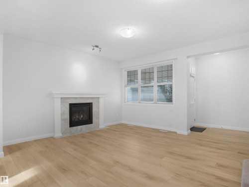 2533 Cole Crescent, Edmonton, AB - Indoor Photo Showing Living Room With Fireplace