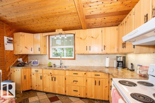 16 Maple Cresent, Rural Westlock County, AB - Indoor Photo Showing Kitchen With Double Sink
