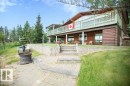 Exterior space with a patio area, a front lawn, and a deck - 16 Maple Cresent, Rural Westlock County, AB  - Outdoor With Deck Patio Veranda 