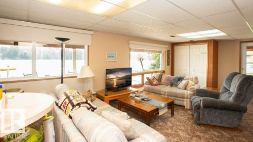16 Maple Cresent, Rural Westlock County, AB - Indoor Photo Showing Living Room With Fireplace