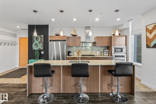 106 2504 109 Street, Edmonton, AB - Indoor Photo Showing Kitchen With Stainless Steel Kitchen With Double Sink With Upgraded Kitchen
