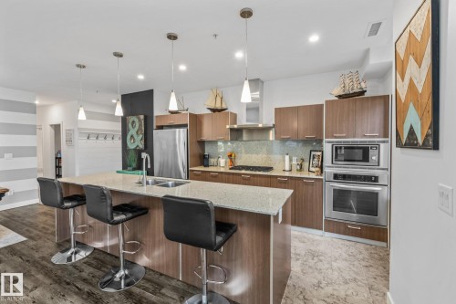 106 2504 109 Street, Edmonton, AB - Indoor Photo Showing Kitchen With Stainless Steel Kitchen With Double Sink With Upgraded Kitchen