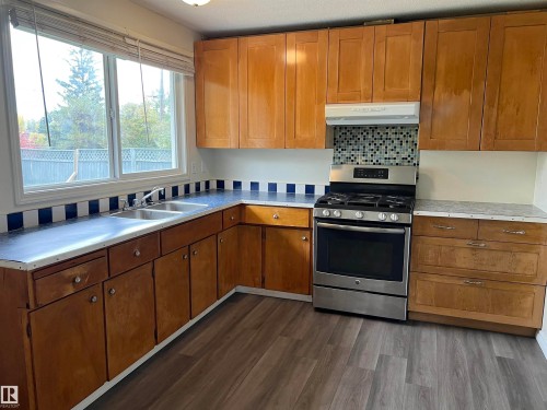 Edmonton, AB - Indoor Photo Showing Kitchen With Double Sink