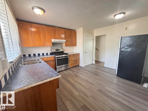 Edmonton, AB - Indoor Photo Showing Kitchen With Double Sink