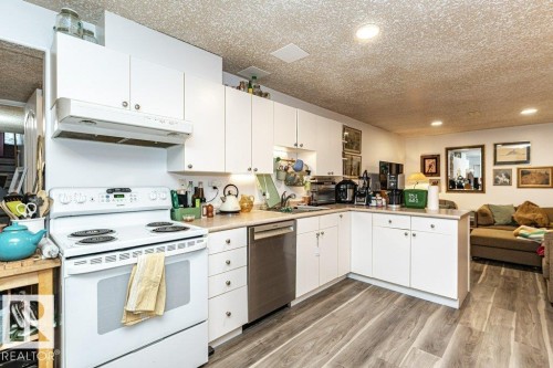 8539 Connors Road, Edmonton, AB - Indoor Photo Showing Kitchen With Double Sink