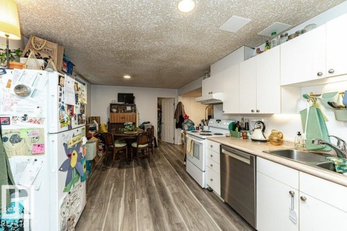 8539 Connors Road, Edmonton, AB - Indoor Photo Showing Kitchen With Double Sink