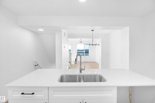 5142 River'S Edge Way, Edmonton, AB - Indoor Photo Showing Kitchen With Double Sink