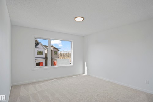 17 19904 31 Avenue, Edmonton, AB - Indoor Photo Showing Other Room