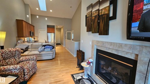36 3003 34 Avenue, Edmonton, AB - Indoor Photo Showing Living Room With Fireplace