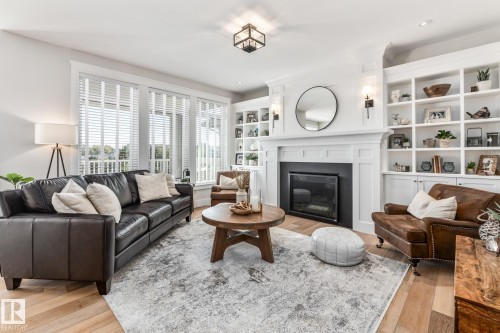 1020 Genesis Lake Boulevard, Stony Plain, AB - Indoor Photo Showing Living Room With Fireplace