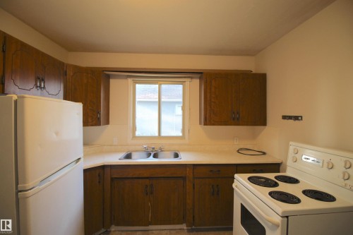 5021 48 Street, Calmar, AB - Indoor Photo Showing Kitchen With Double Sink