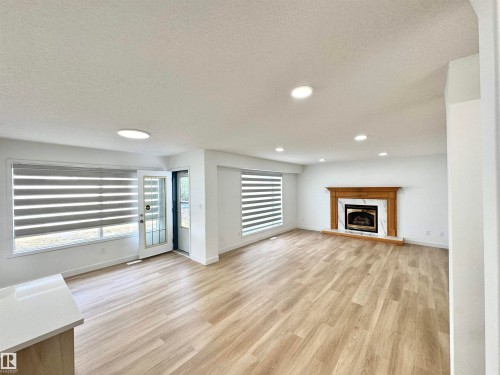 2908 44A Avenue, Edmonton, AB - Indoor Photo Showing Living Room With Fireplace