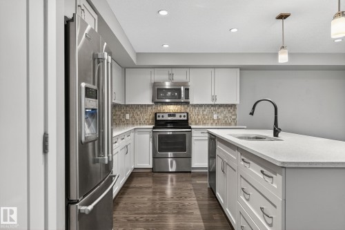 102 5029 Edgemont Boulevard, Edmonton, AB - Indoor Photo Showing Kitchen With Upgraded Kitchen