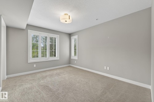 102 5029 Edgemont Boulevard, Edmonton, AB - Indoor Photo Showing Other Room