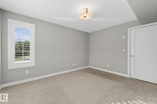 102 5029 Edgemont Boulevard, Edmonton, AB - Indoor Photo Showing Other Room