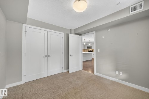 102 5029 Edgemont Boulevard, Edmonton, AB - Indoor Photo Showing Other Room