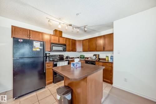 134 16311 95 Street, Edmonton, AB - Indoor Photo Showing Kitchen With Double Sink
