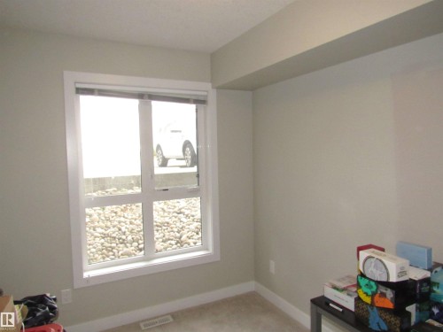 90 2560 Pegasus Boulevard, Edmonton, AB - Indoor Photo Showing Other Room