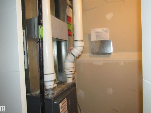 90 2560 Pegasus Boulevard, Edmonton, AB - Indoor Photo Showing Basement