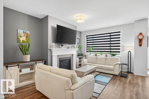 17096 46 Street, Edmonton, AB - Indoor Photo Showing Living Room With Fireplace