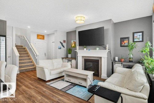 17096 46 Street, Edmonton, AB - Indoor Photo Showing Living Room With Fireplace