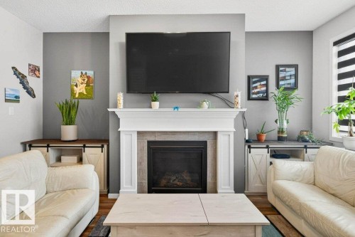 17096 46 Street, Edmonton, AB - Indoor Photo Showing Living Room With Fireplace