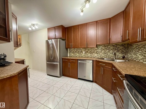 221 Callingwood Place, Edmonton, AB - Indoor Photo Showing Kitchen With Stainless Steel Kitchen With Double Sink