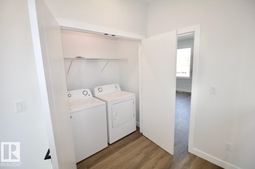 Upper 5803 97A Avenue, Edmonton, AB - Indoor Photo Showing Laundry Room