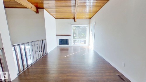 15 Northwoods Village, Edmonton, AB - Indoor Photo Showing Other Room With Fireplace