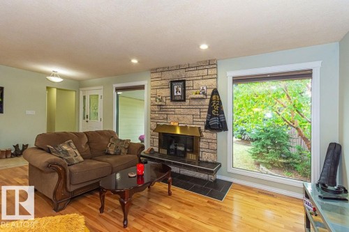 1720 89 Street, Edmonton, AB - Indoor Photo Showing Living Room With Fireplace