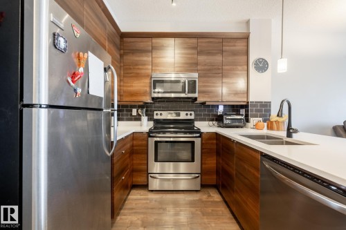 202 2590 Anderson Way, Edmonton, AB - Indoor Photo Showing Kitchen With Double Sink