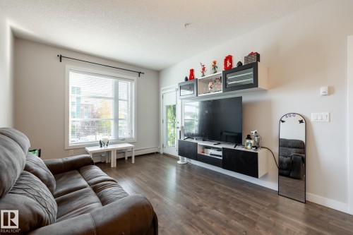 202 2590 Anderson Way, Edmonton, AB - Indoor Photo Showing Living Room