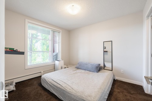 202 2590 Anderson Way, Edmonton, AB - Indoor Photo Showing Bedroom