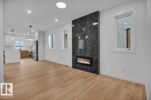 11124 132 Street, Edmonton, AB - Indoor Photo Showing Living Room With Fireplace
