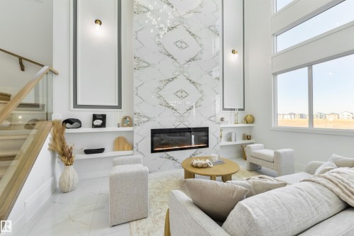 108 25 Street Sw, Edmonton, AB - Indoor Photo Showing Living Room With Fireplace