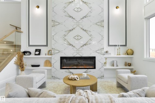 108 25 Street Sw, Edmonton, AB - Indoor Photo Showing Living Room With Fireplace