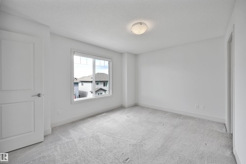 35 2922 Maple Way, Edmonton, AB - Indoor Photo Showing Other Room