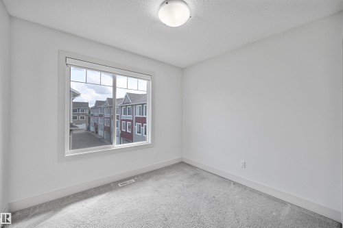 35 2922 Maple Way, Edmonton, AB - Indoor Photo Showing Other Room